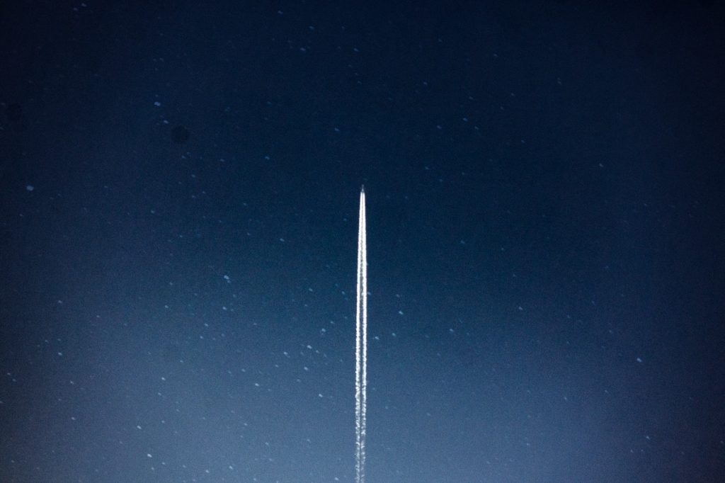 A rocket launching into space.