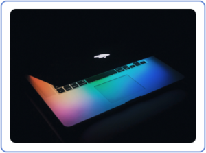 Computer with rainbow background